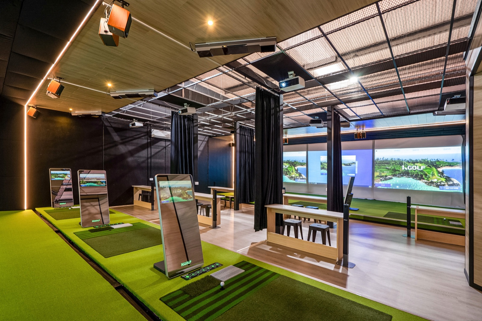 Players competing in a K Golf bay