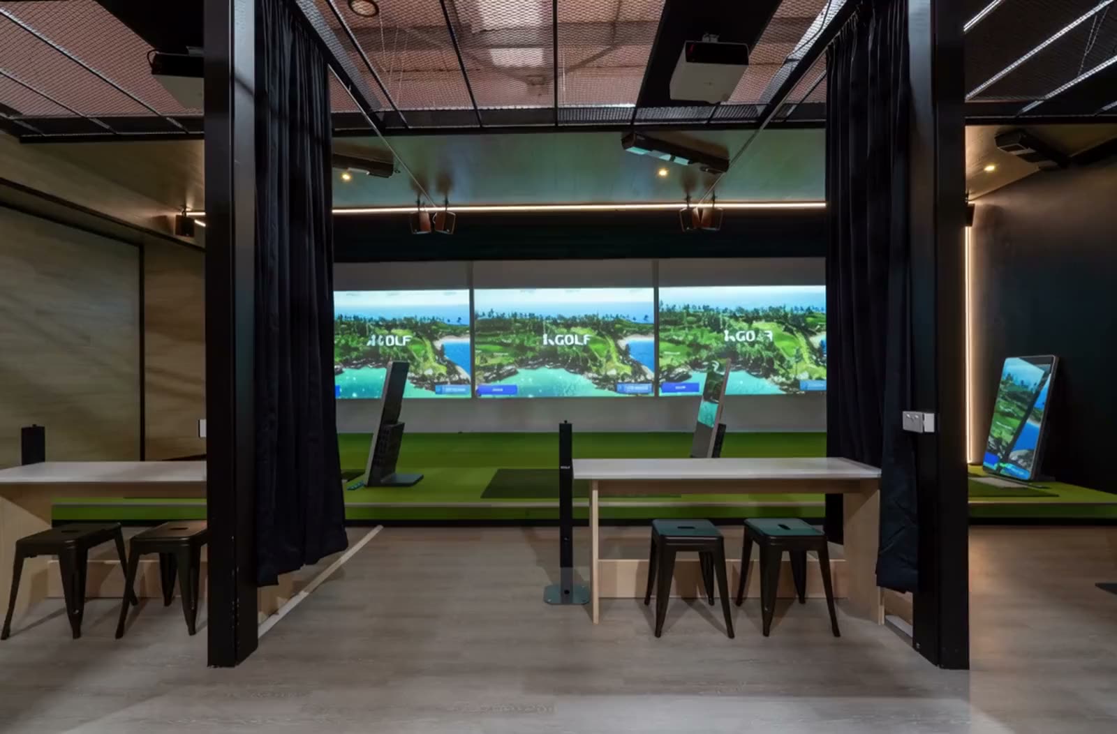Simulator bays at K Golf, Wairau Valley